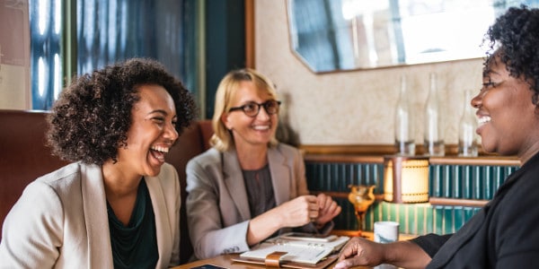 questions ask - women talking at a table