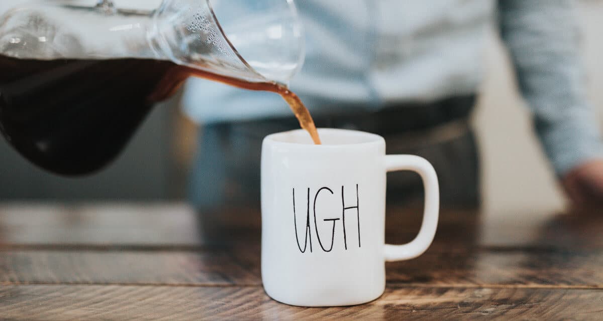 stay motivated goal - man pouring coffee into coffee cup that says "ugh"